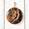 Charm redondo resina XL marrón