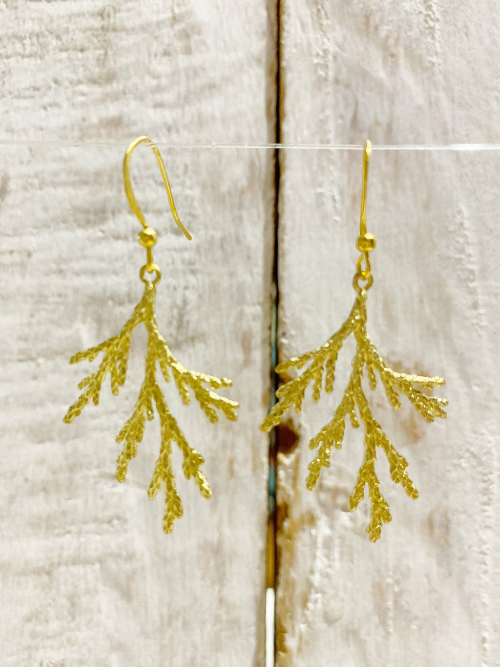 Pendientes rama dorada