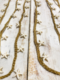 Collar tejido estrellas