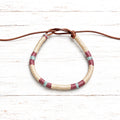 Pulsera cuero natural y berenjena