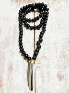 Collar pieza franjas semillas negro