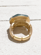 Anillo metal dorado resina verde elástico