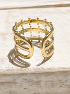 Anillo acero dorado corona tres filas