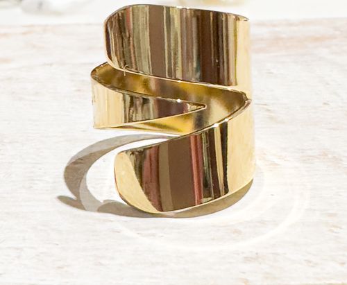 Anillo acero dorado pico