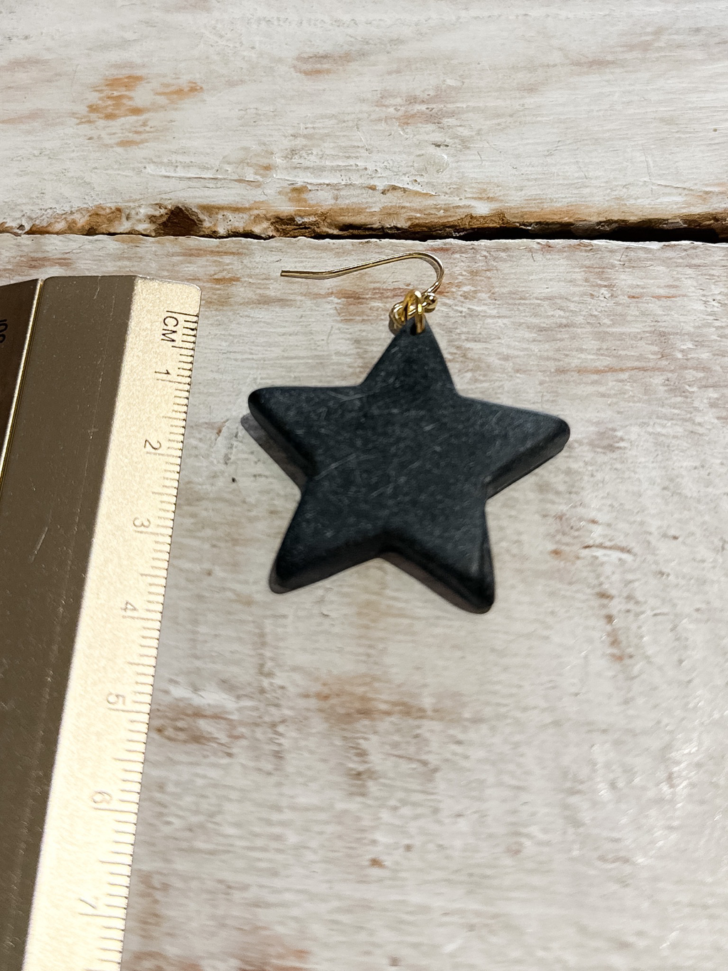 Pendientes estrella resina negros