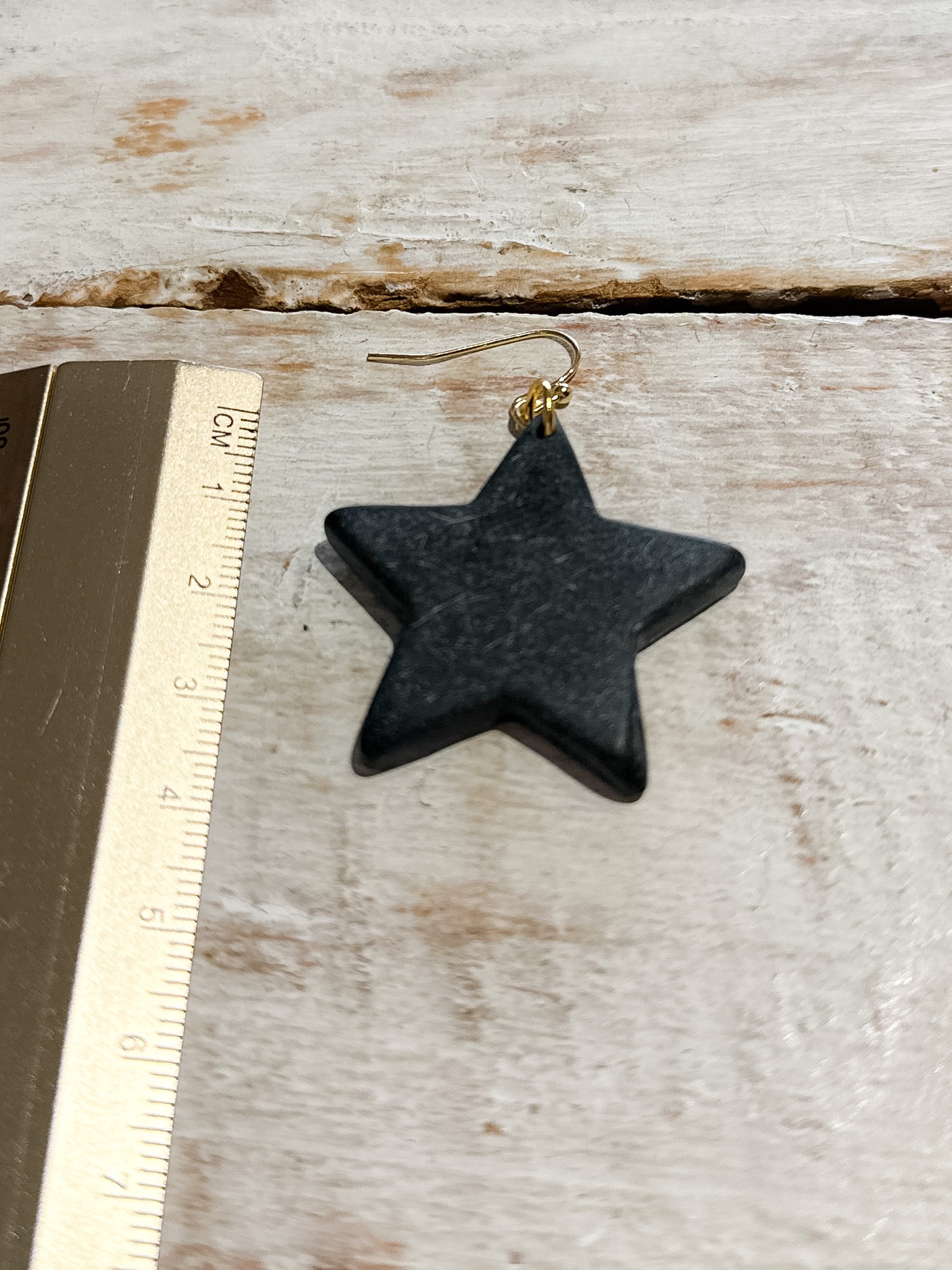 Pendientes estrella resina negros