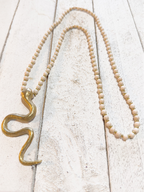 Collar natural serpiente bronce dorada
