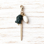 Charm cabeza verde