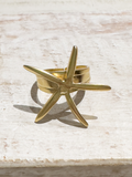 Anillo latón baño oro estrella