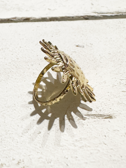 Anillo acero dorado sol