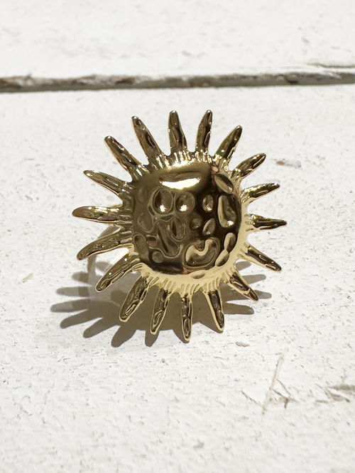 Anillo acero dorado sol