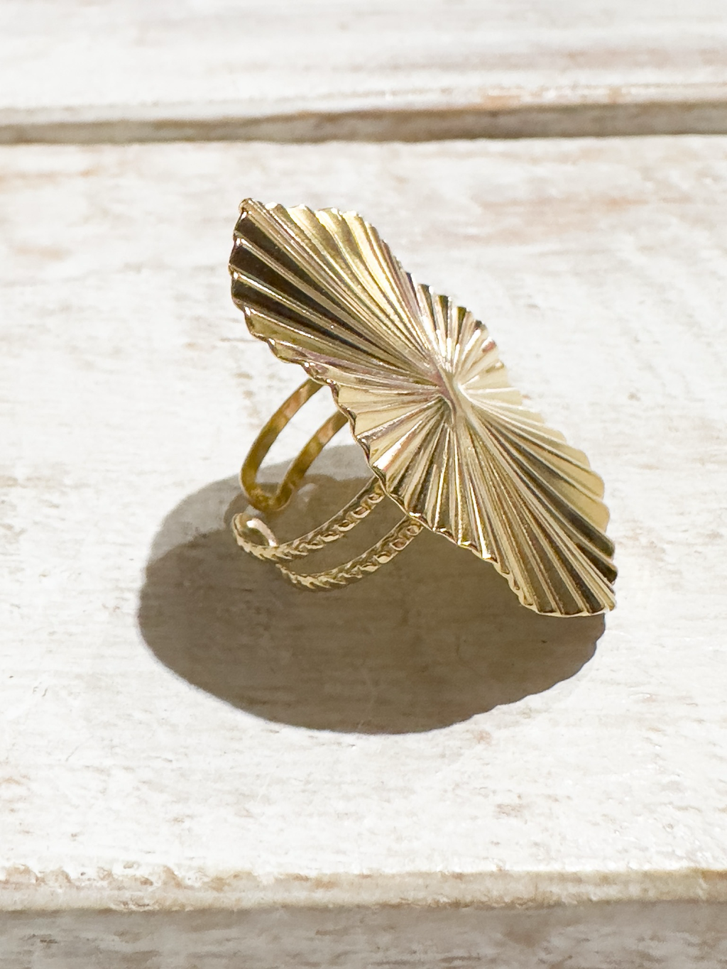 Anillo acero dorado rayos XL