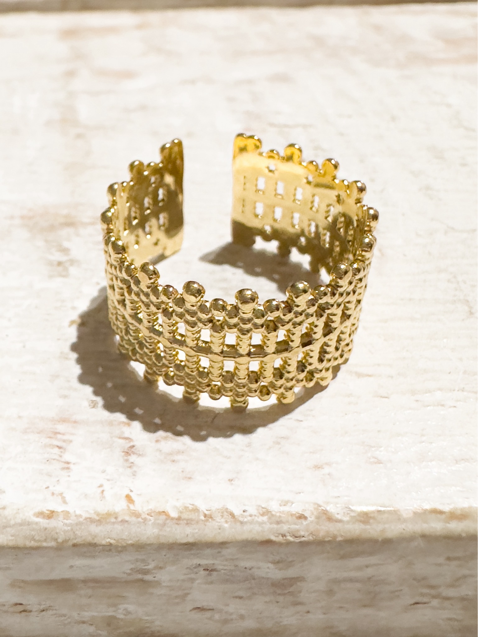 Anillo acero dorado corona
