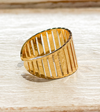 Anillo acero dorado barrotes
