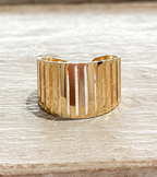 Anillo acero dorado barrotes