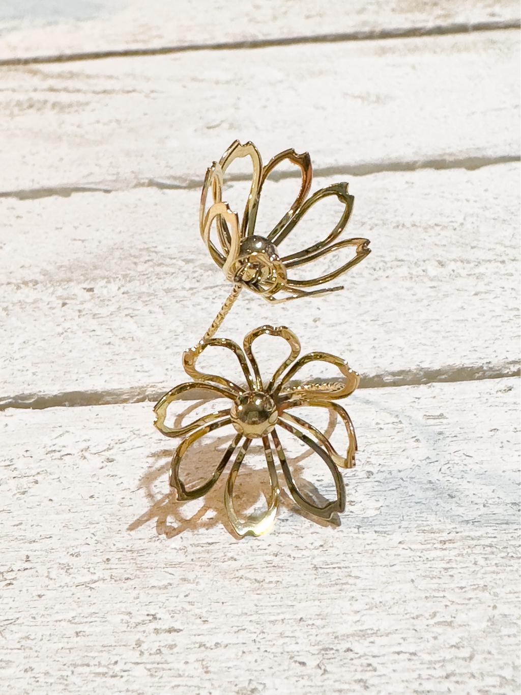 Anillo acero dorado doble flor