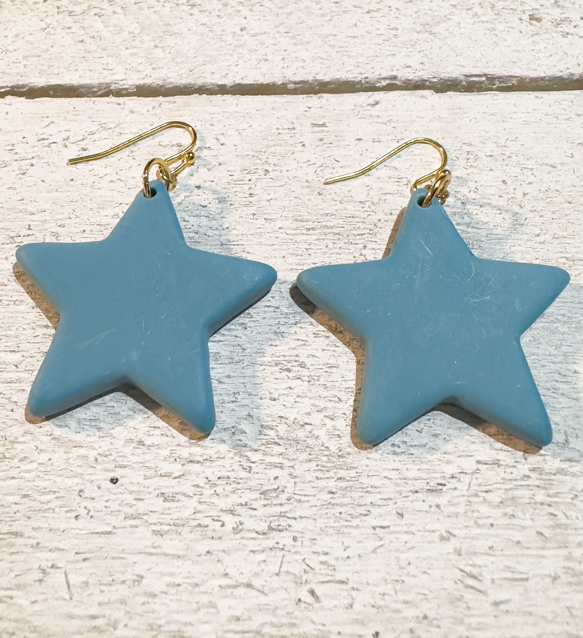 Pendientes estrella resina azul vaquero