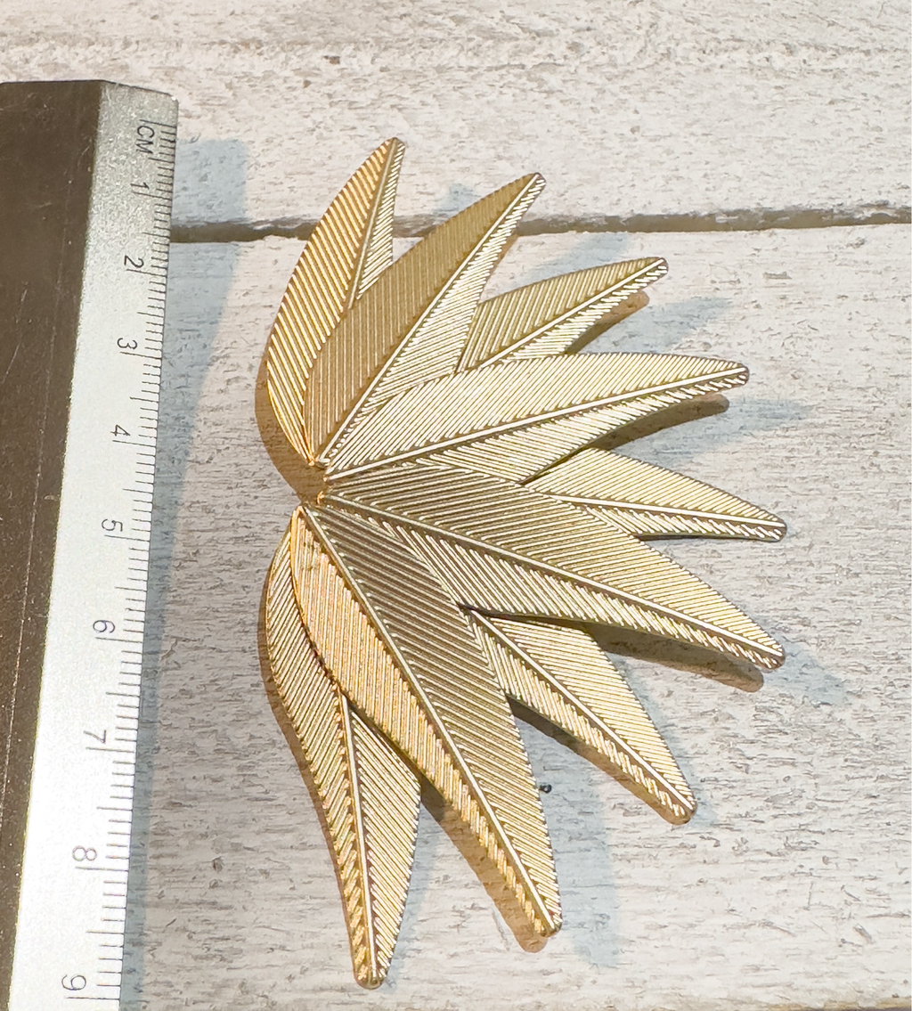 Pendientes nueve hojas metal dorado