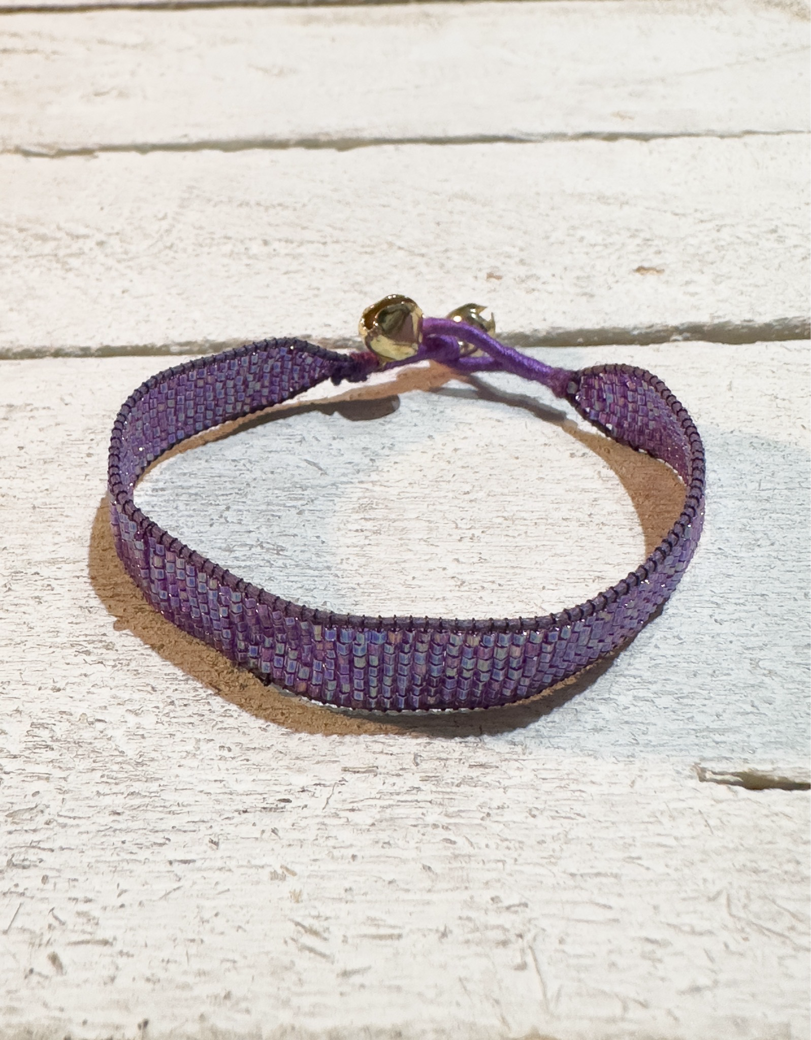 Pulsera miyuki cristales morado oscuro cascabel 1cm