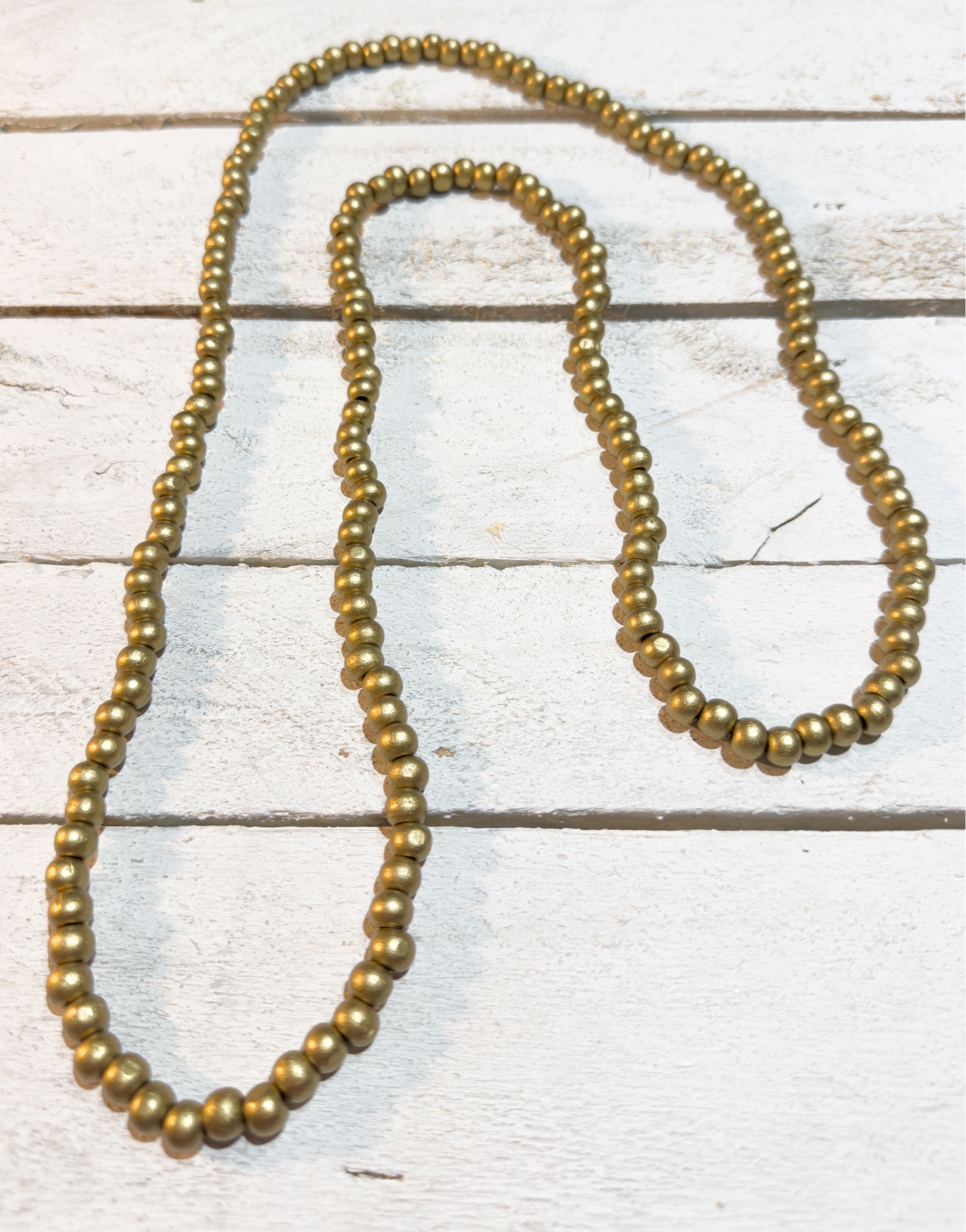 Collar largo madera dorado
