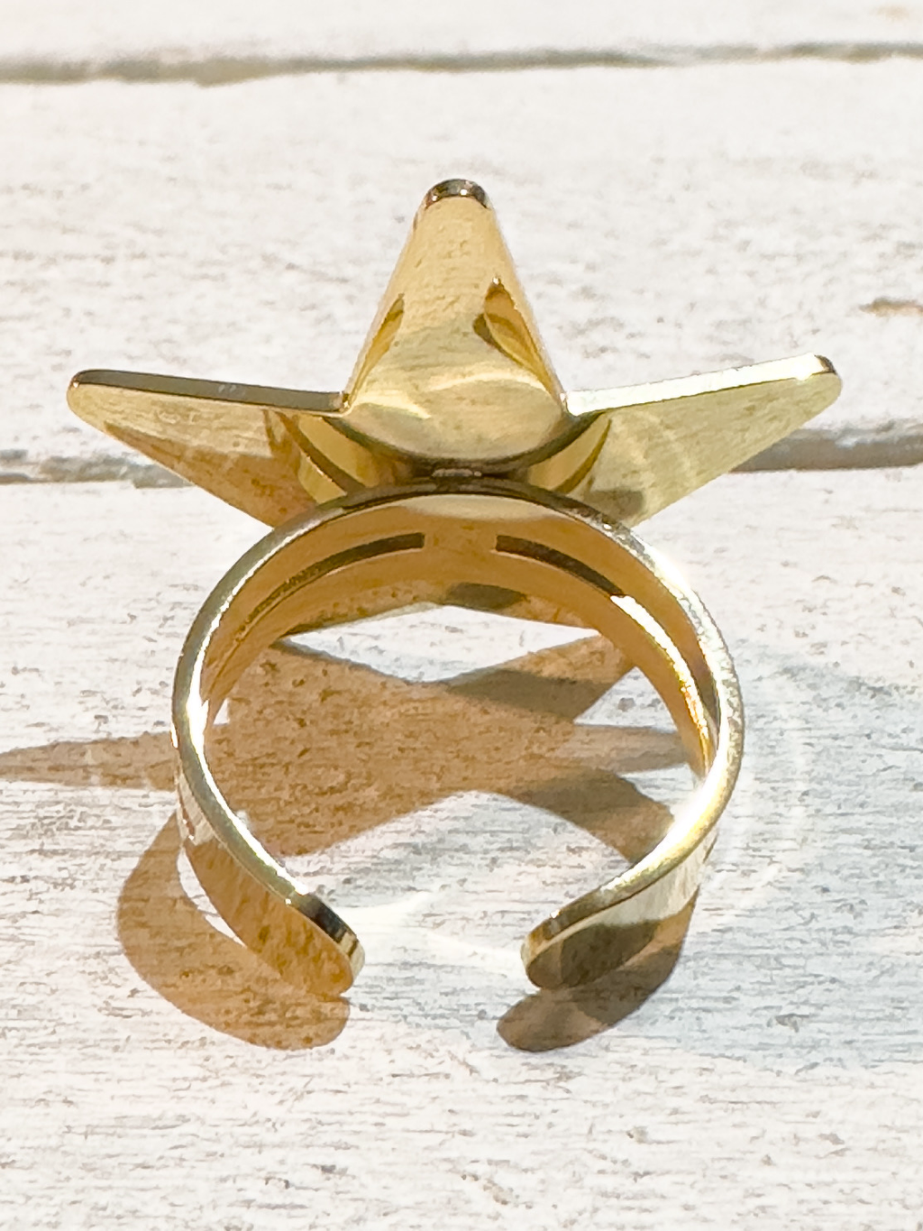 Anillo acero dorado estrella