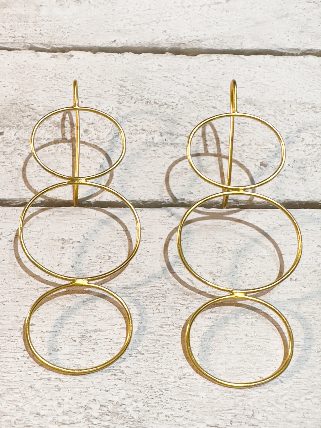 Pendientes triple aro rígido dorado