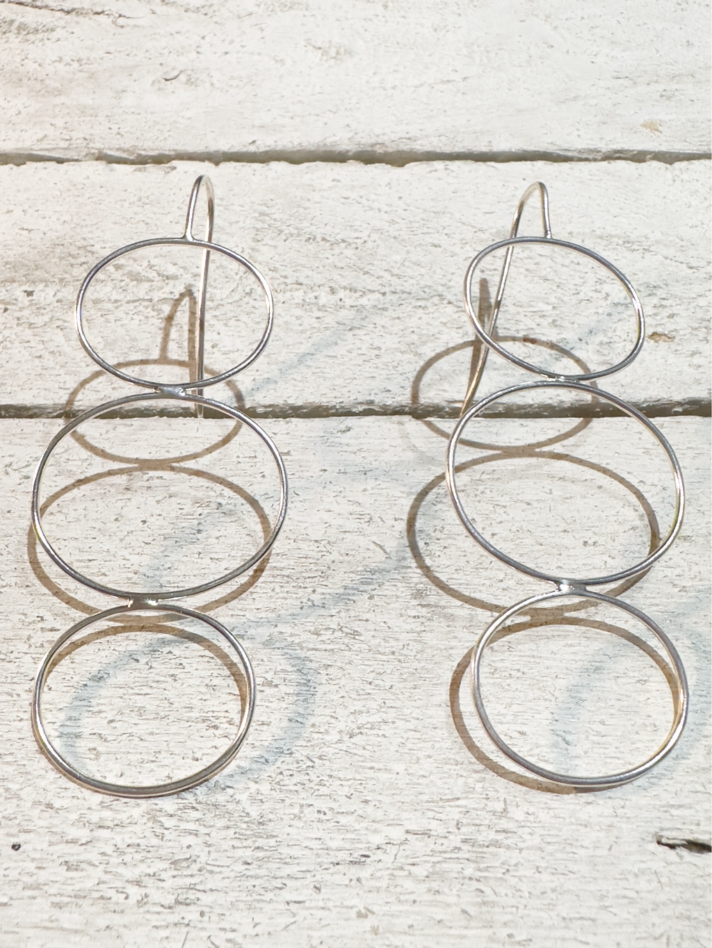 Pendientes triple aro rígido plateado