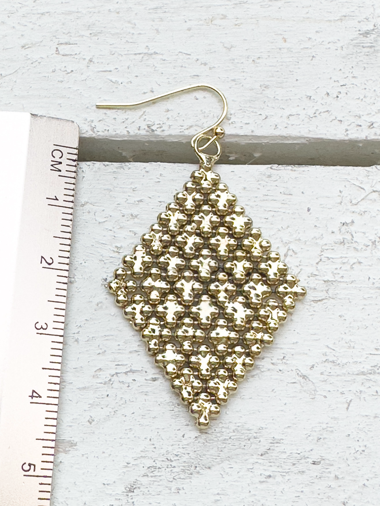 Pendientes rombo dorado