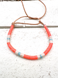 Pulsera cuero naranja flúor y azul