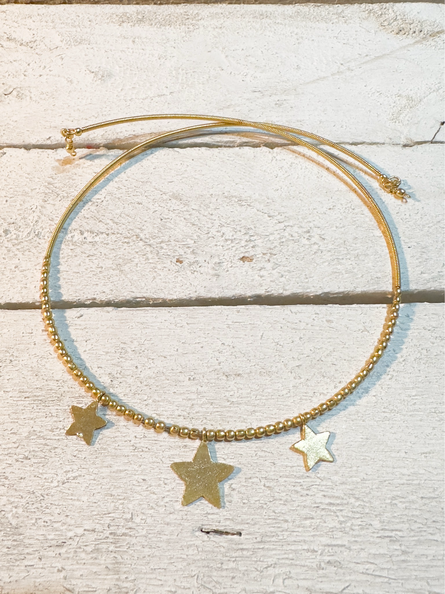 Gargantilla tres estrellas