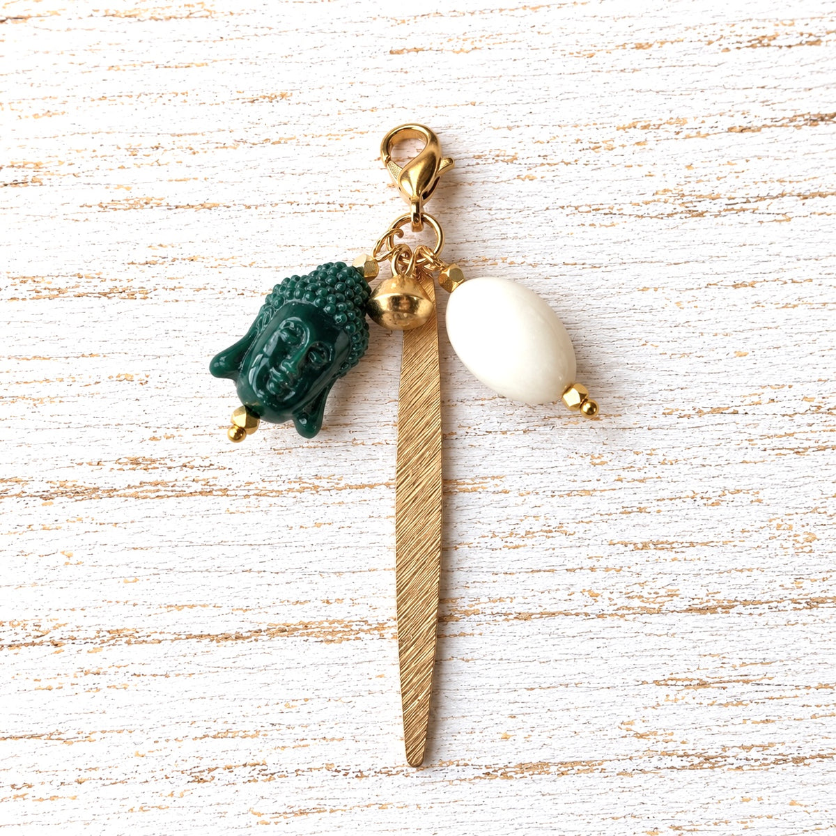 Charm cabeza verde