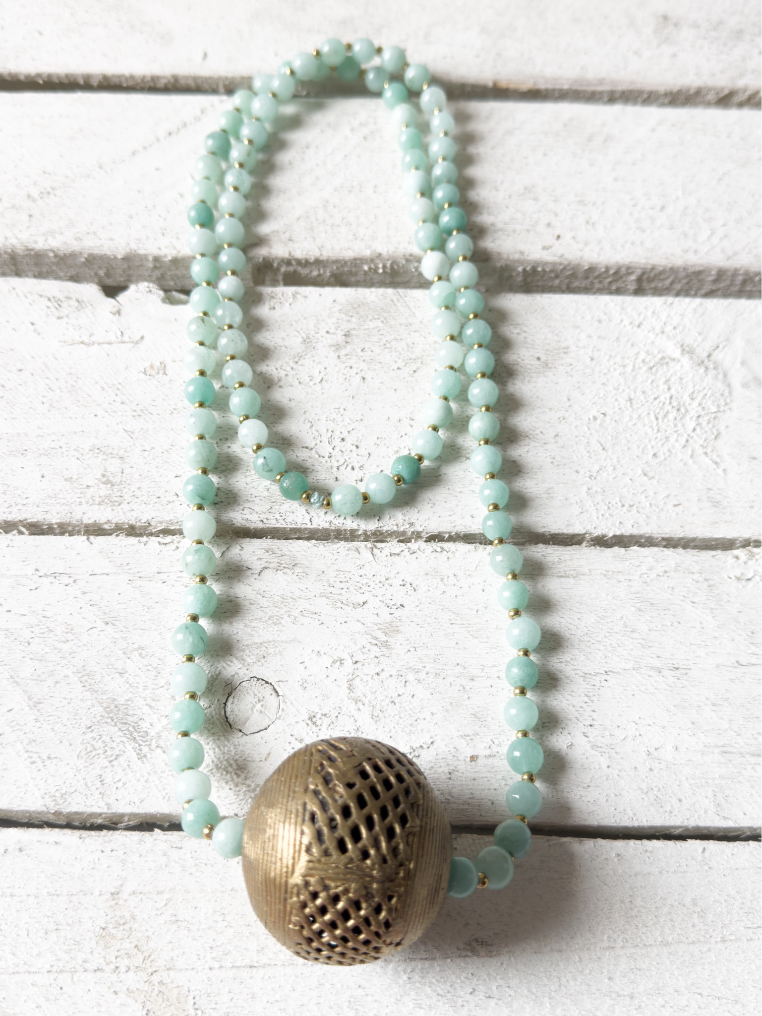 Collar piedra agua bola bronce dorada