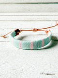 Pulsera ancha cuero agua/rosa