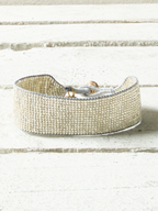 Pulsera miyuki cristales plata cuerda gris cascabel 2cm