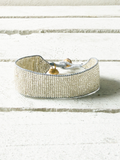 Pulsera miyuki cristales plata cuerda gris cascabel 2cm