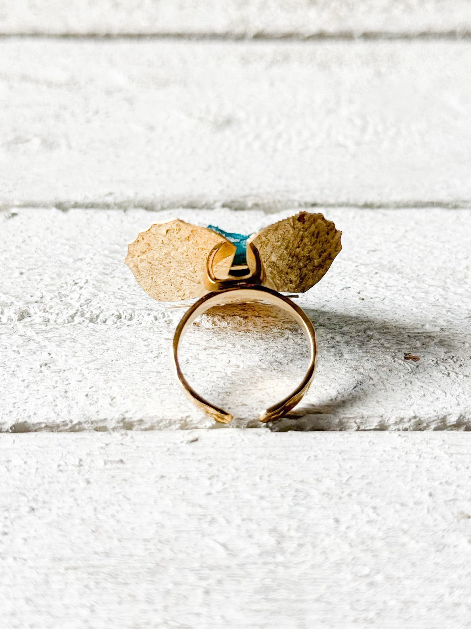 Anillo flor tela