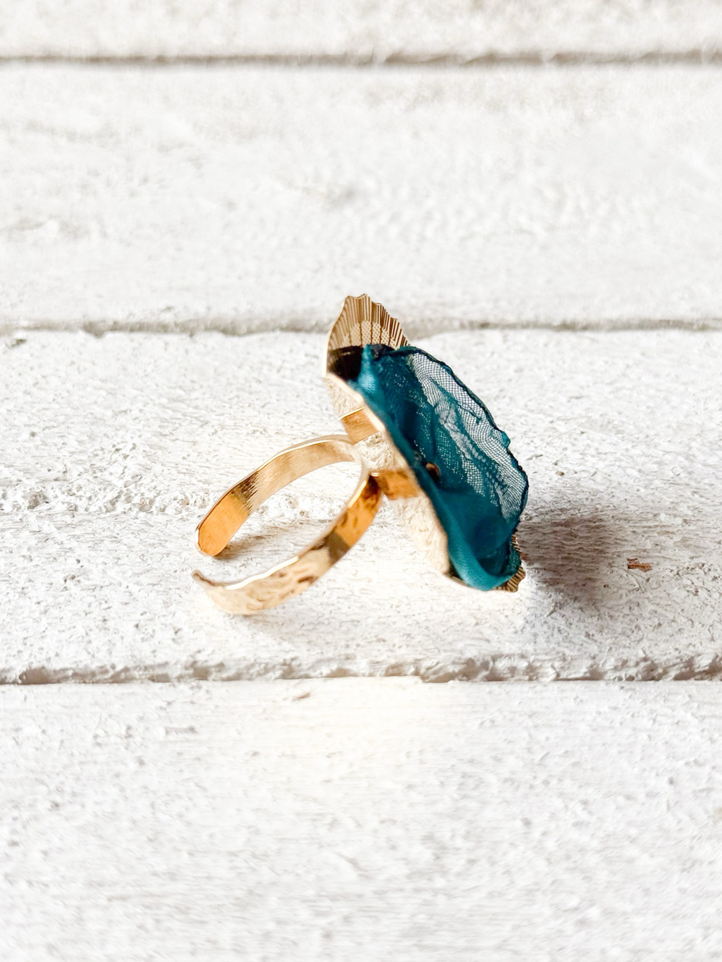 Anillo flor tela