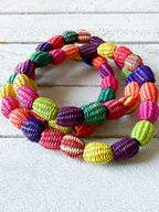 Collar bolas paja
