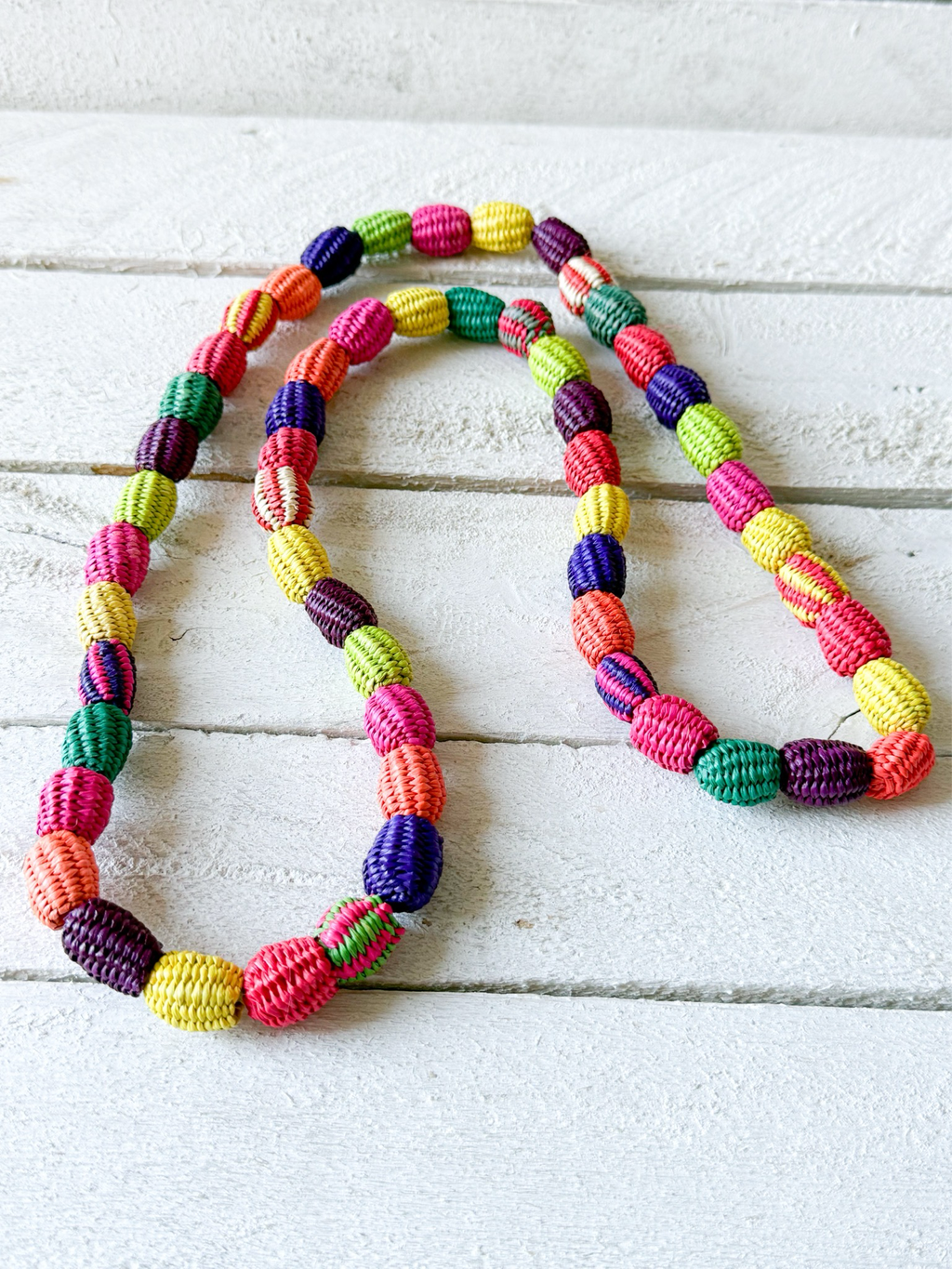 Collar bolas paja