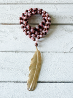 Collar bicolor pluma