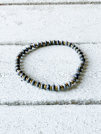Pulsera piedra plana gris