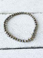 Pulsera piedra plana gris
