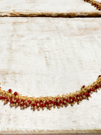 Cadena cordón bolitas rojas