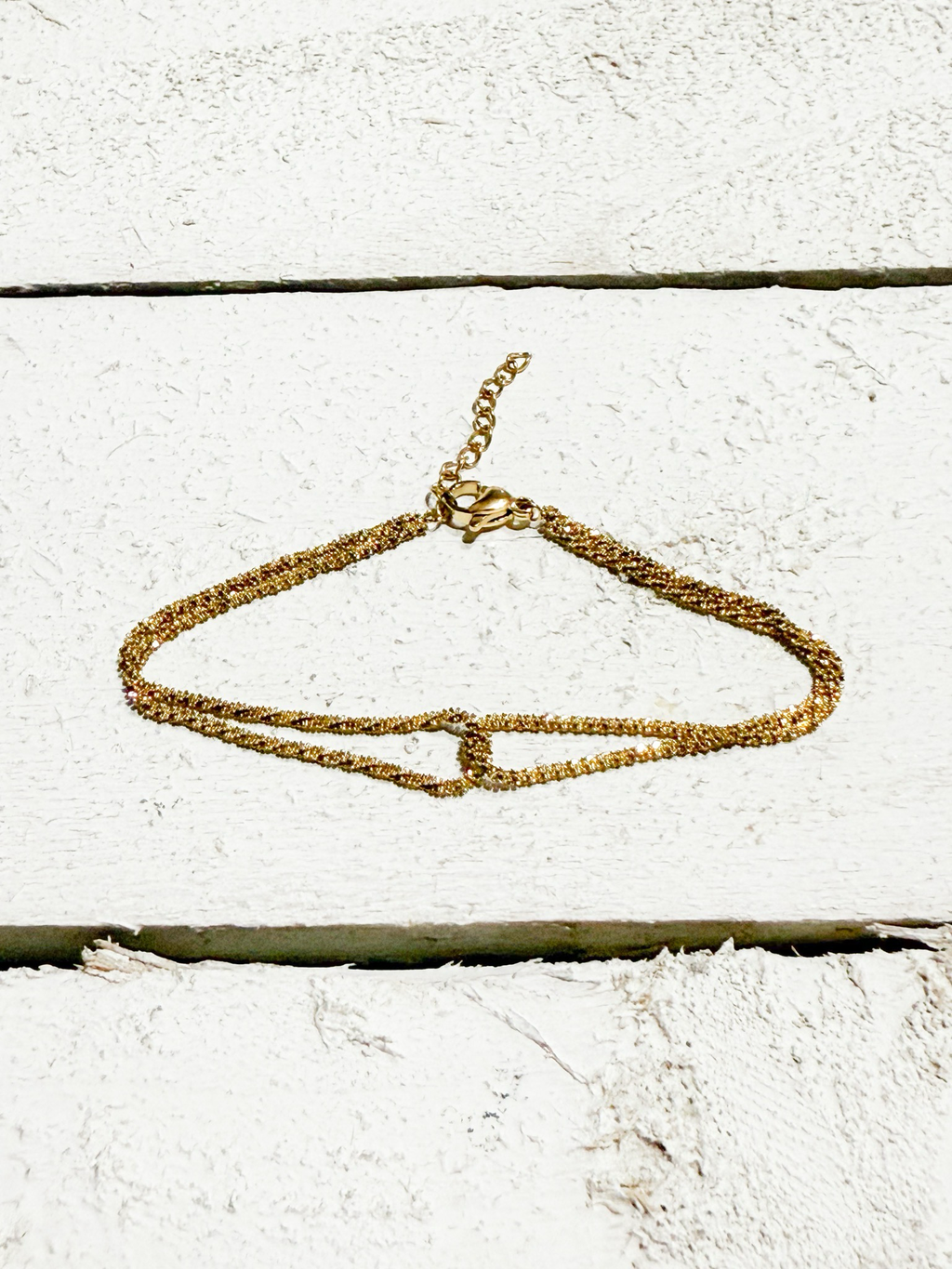 Pulsera cruzada dorada