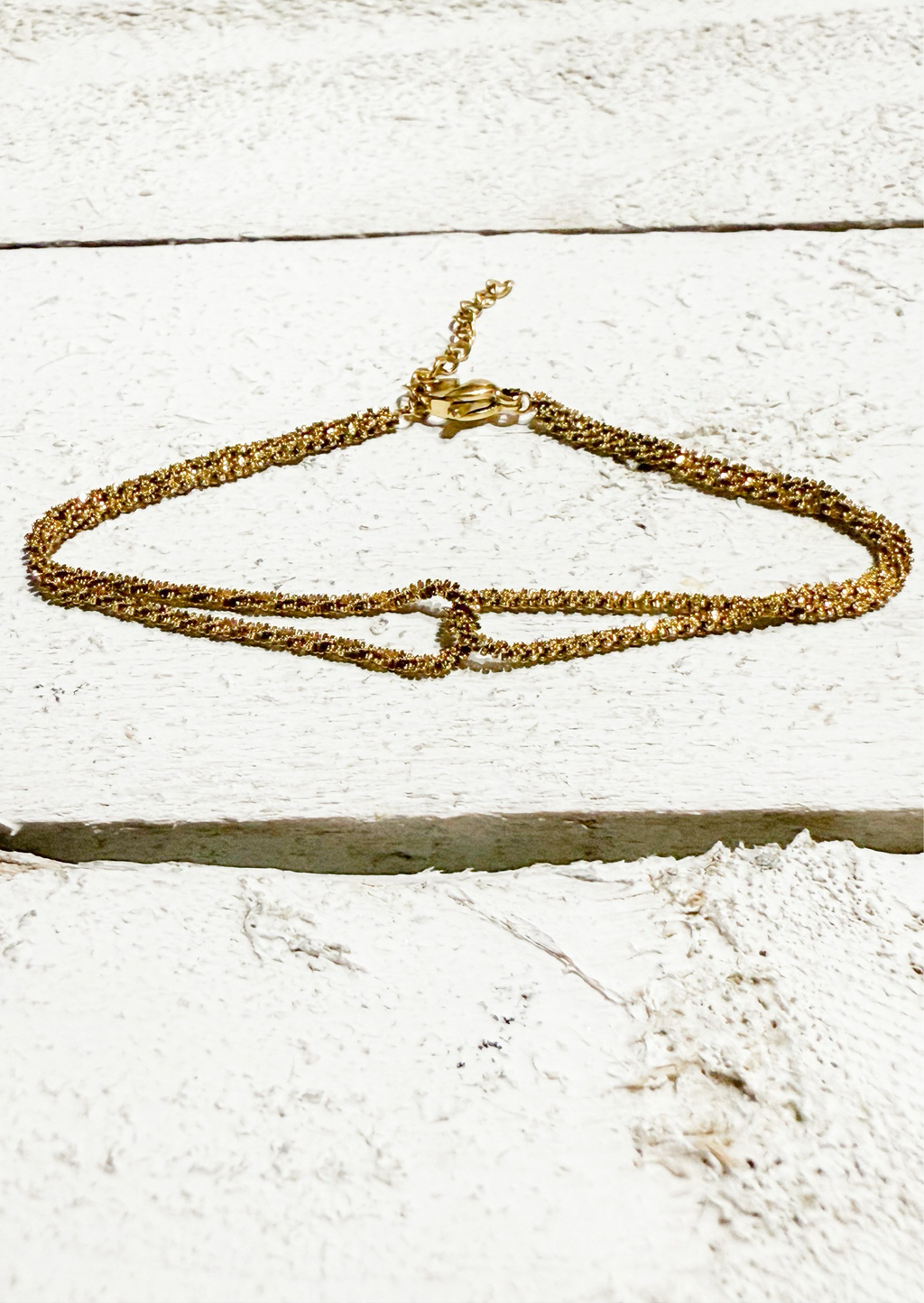Pulsera cruzada dorada