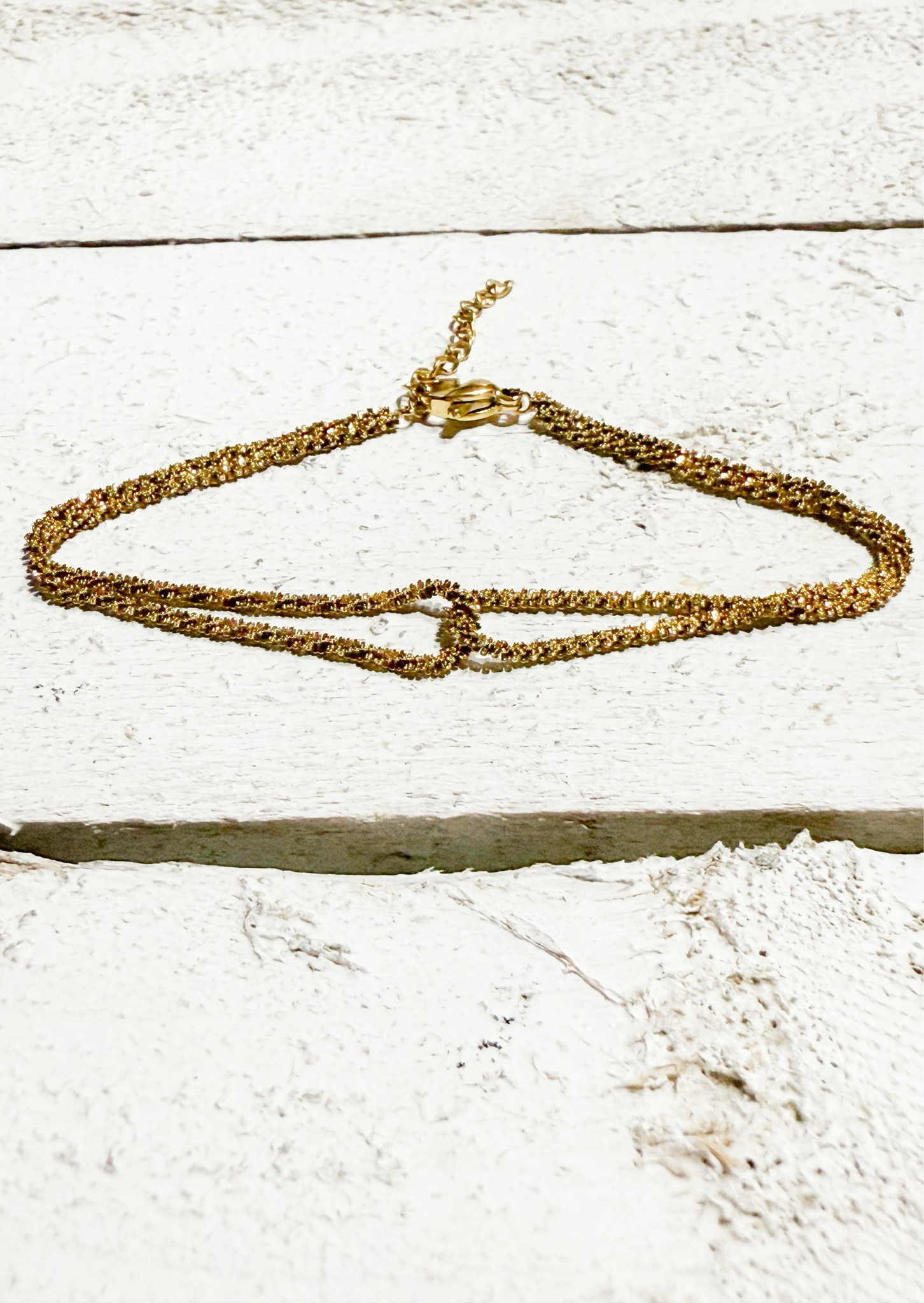 Pulsera cruzada dorada