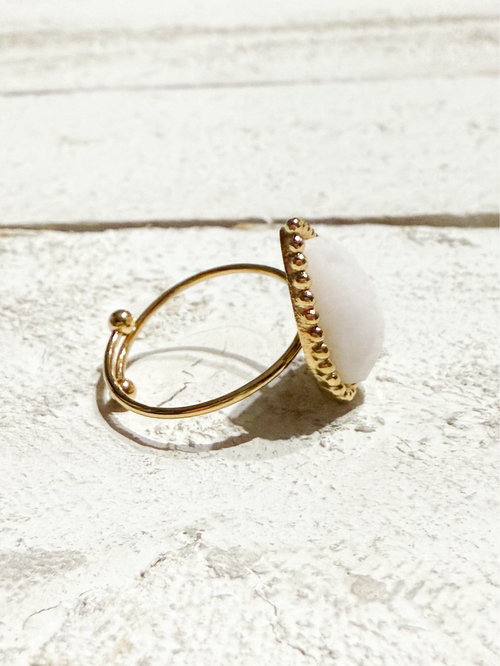 Anillo gota piedra blanca facetada