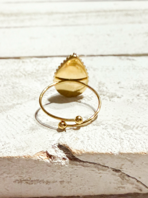 Anillo gota piedra sol facetada