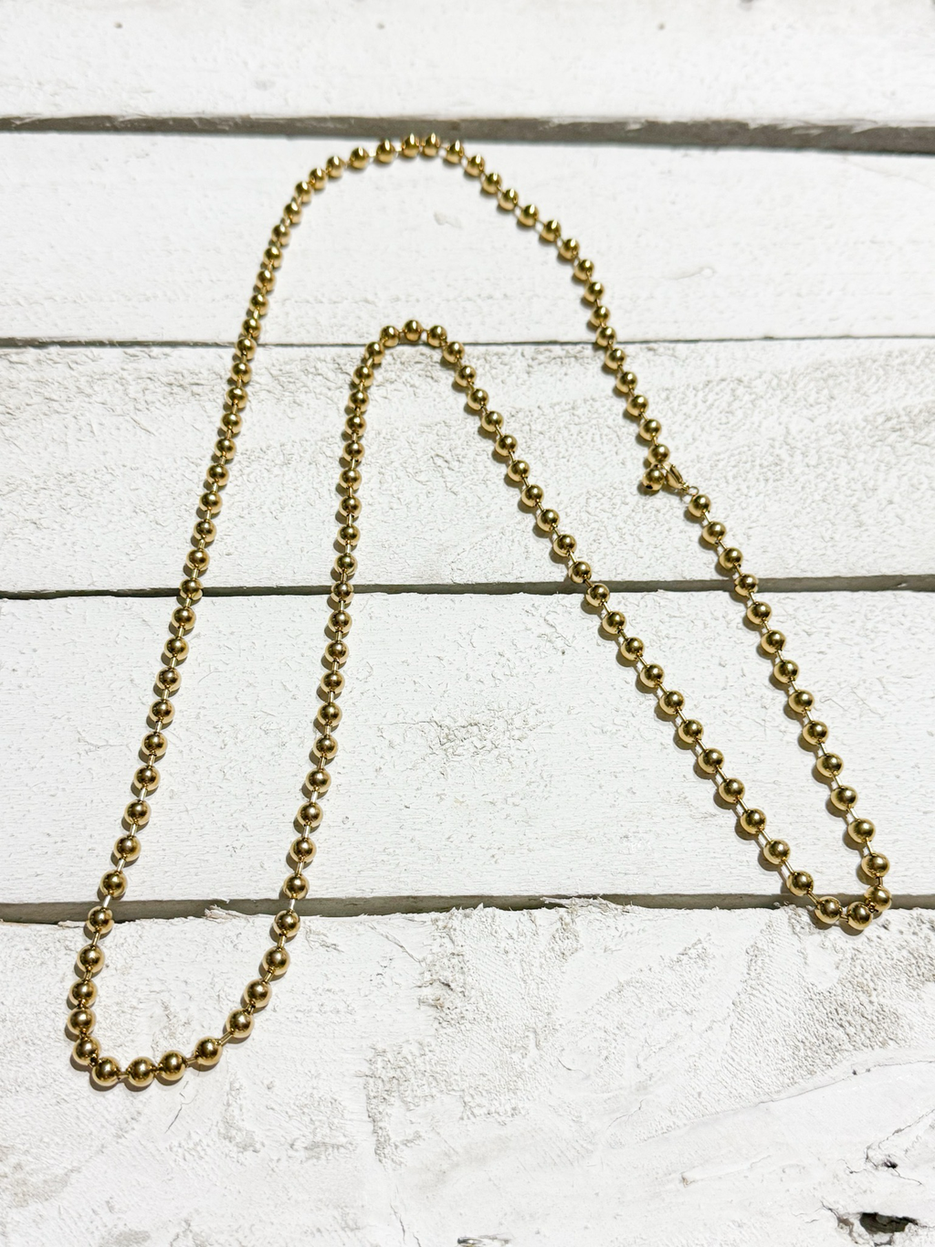 Collar gargantilla bolitas acero dorado