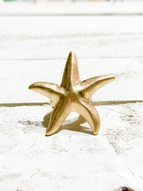 Anillo estrella dorado elástico